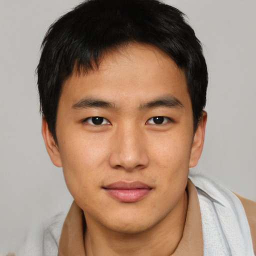 Neutral asian young-adult male with short  brown hair and brown eyes