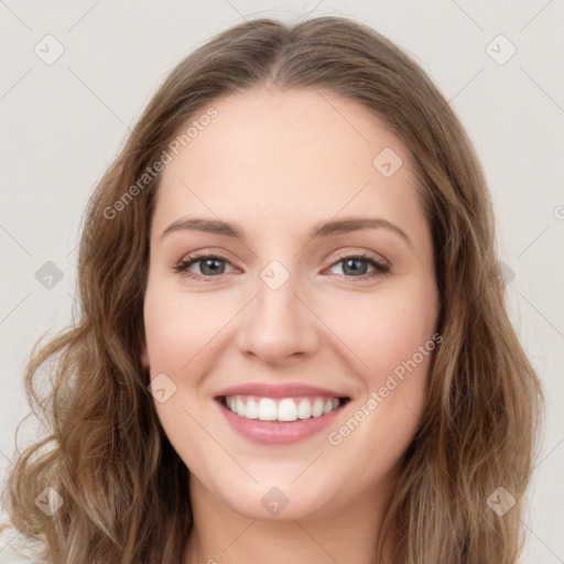 Joyful white young-adult female with long  brown hair and green eyes