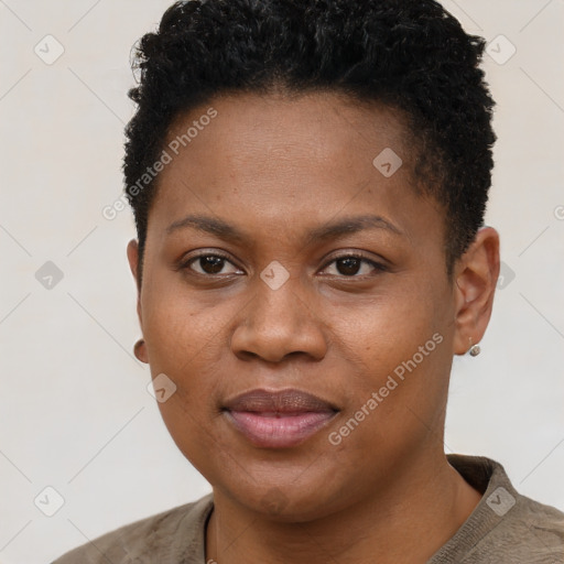 Joyful black young-adult female with short  brown hair and brown eyes