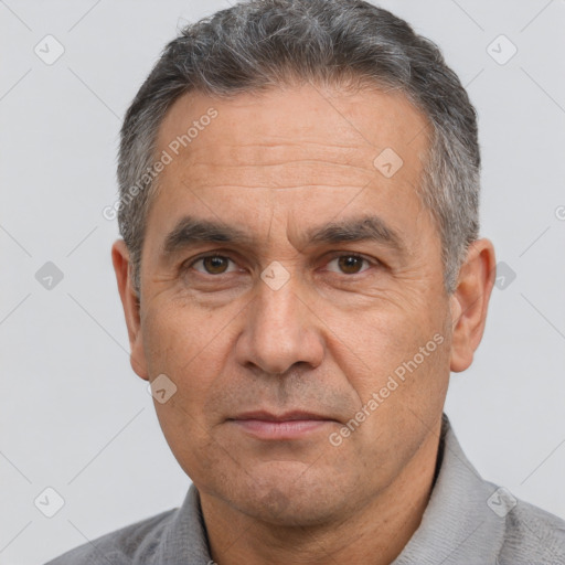 Neutral white middle-aged male with short  brown hair and brown eyes