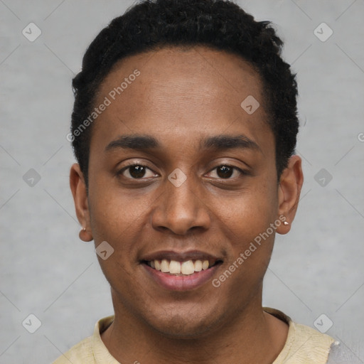 Joyful black young-adult male with short  black hair and brown eyes
