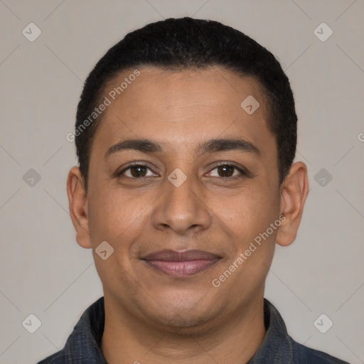 Joyful latino young-adult male with short  black hair and brown eyes