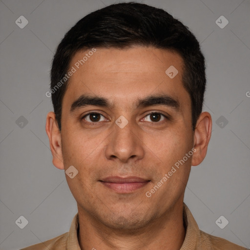 Joyful white young-adult male with short  black hair and brown eyes