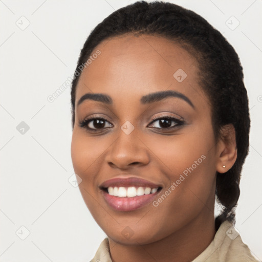 Joyful latino young-adult female with long  black hair and brown eyes