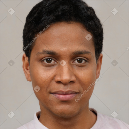 Joyful black young-adult male with short  black hair and brown eyes