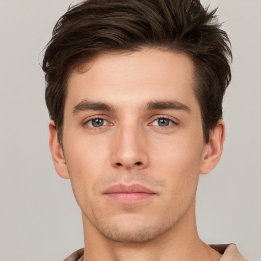 Neutral white young-adult male with short  brown hair and brown eyes