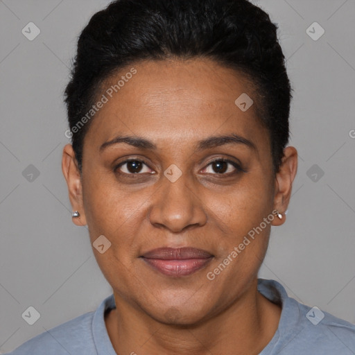 Joyful black adult female with short  brown hair and brown eyes