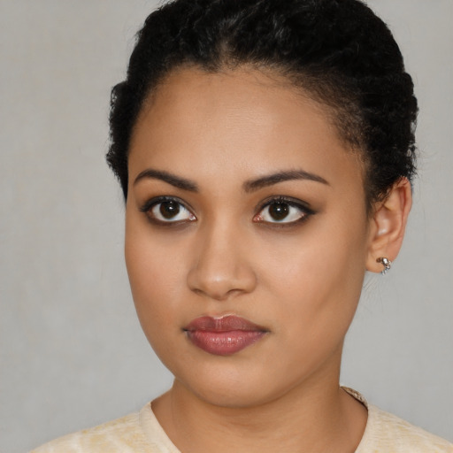 Neutral latino young-adult female with short  brown hair and brown eyes