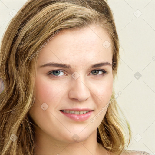 Joyful white young-adult female with long  brown hair and green eyes