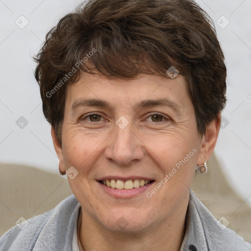 Joyful white adult female with short  brown hair and brown eyes