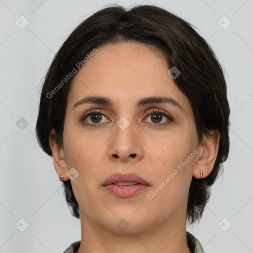 Joyful white young-adult female with medium  brown hair and brown eyes