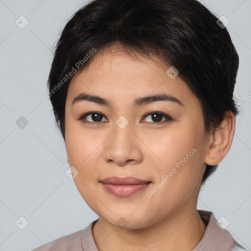 Joyful asian young-adult female with short  brown hair and brown eyes