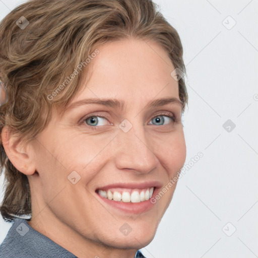 Joyful white young-adult female with medium  brown hair and blue eyes