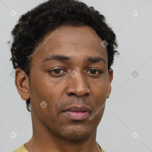 Neutral black young-adult male with short  brown hair and brown eyes