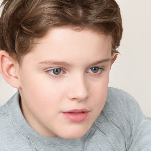 Neutral white child male with short  brown hair and grey eyes