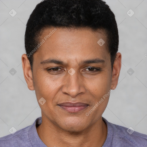 Joyful latino young-adult male with short  brown hair and brown eyes