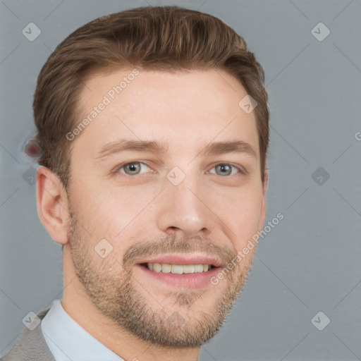 Joyful white young-adult male with short  brown hair and grey eyes