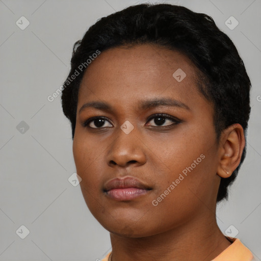 Neutral black young-adult female with short  black hair and brown eyes