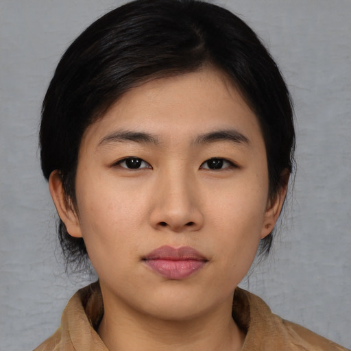 Neutral asian young-adult female with medium  black hair and brown eyes