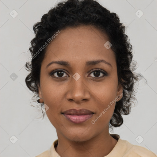 Joyful black young-adult female with medium  brown hair and brown eyes