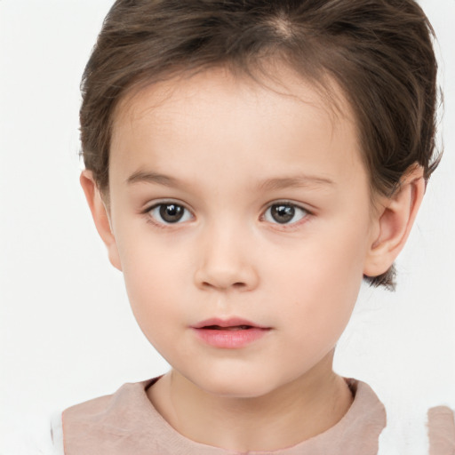 Neutral white child female with short  brown hair and brown eyes