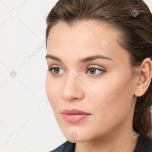 Neutral white young-adult female with medium  brown hair and brown eyes