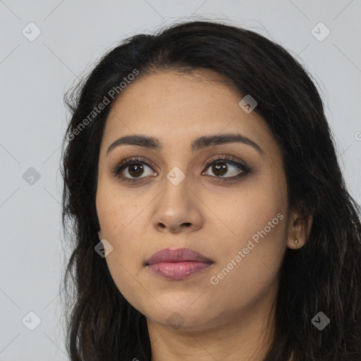 Joyful latino young-adult female with long  black hair and brown eyes