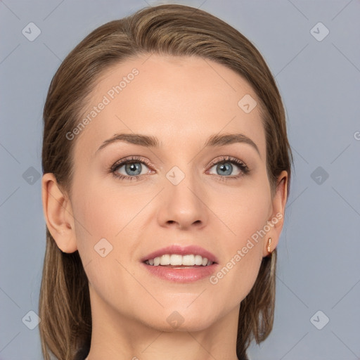 Joyful white young-adult female with medium  brown hair and grey eyes