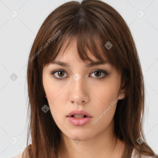 Neutral white young-adult female with medium  brown hair and brown eyes