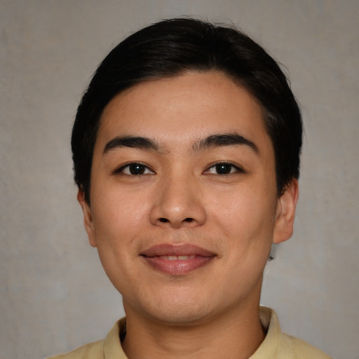 Joyful asian young-adult female with short  black hair and brown eyes
