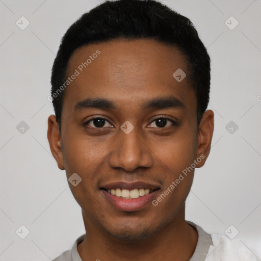 Joyful black young-adult male with short  black hair and brown eyes