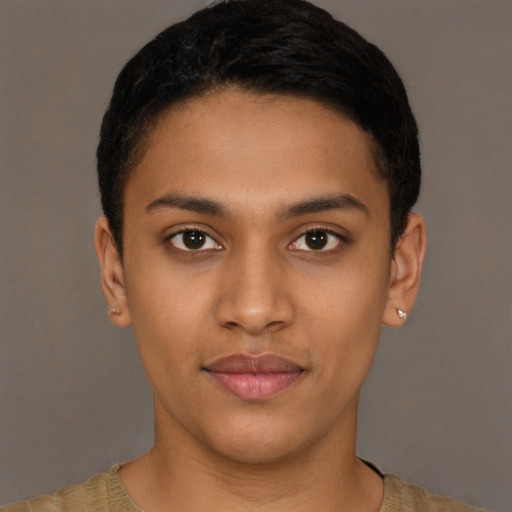 Joyful latino young-adult male with short  brown hair and brown eyes