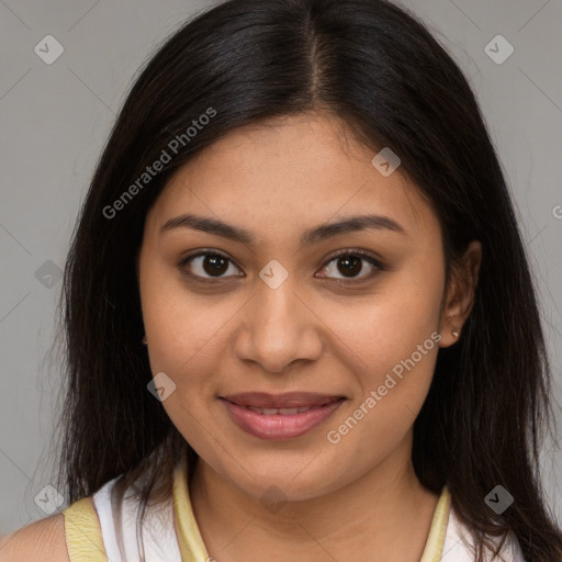 Joyful latino young-adult female with medium  brown hair and brown eyes