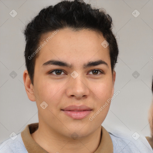 Joyful latino young-adult male with short  brown hair and brown eyes