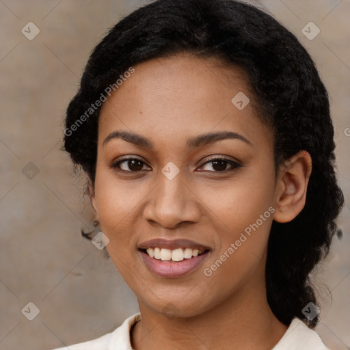 Joyful black young-adult female with medium  black hair and brown eyes