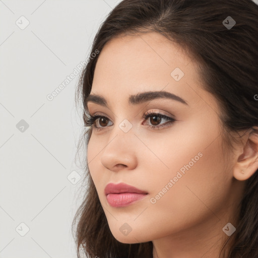 Neutral white young-adult female with long  brown hair and brown eyes