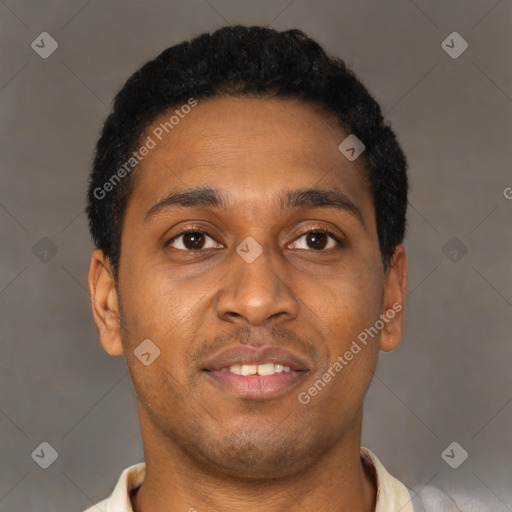 Joyful latino young-adult male with short  brown hair and brown eyes