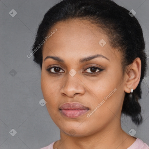 Joyful black young-adult female with medium  brown hair and brown eyes