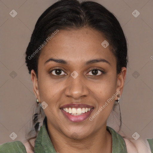 Joyful black young-adult female with medium  brown hair and brown eyes