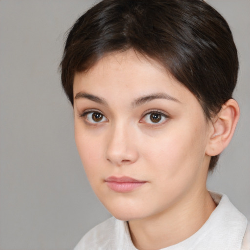 Neutral white young-adult female with short  brown hair and brown eyes