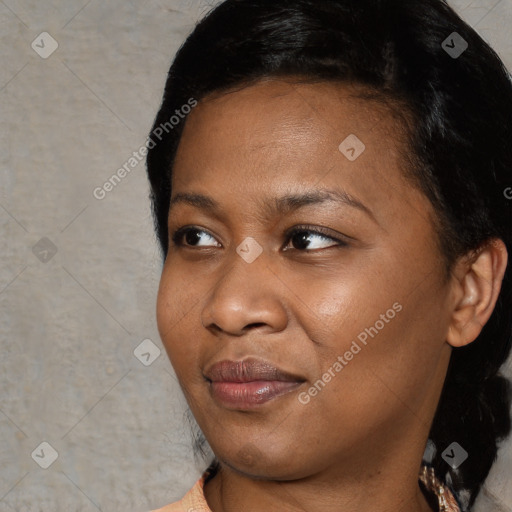 Joyful asian young-adult female with short  black hair and brown eyes