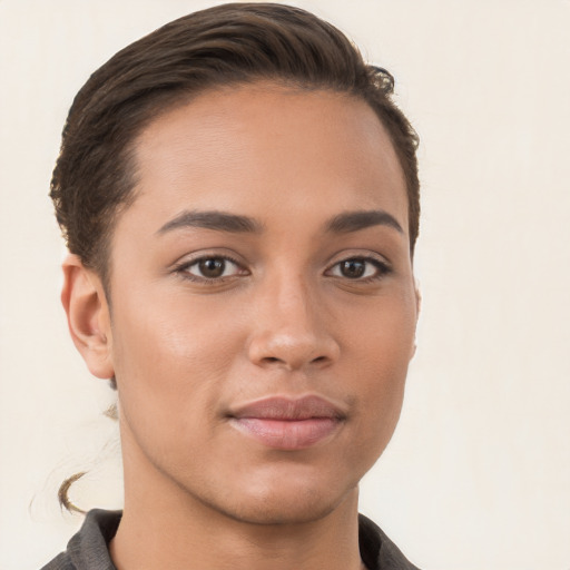 Joyful white young-adult female with short  brown hair and brown eyes