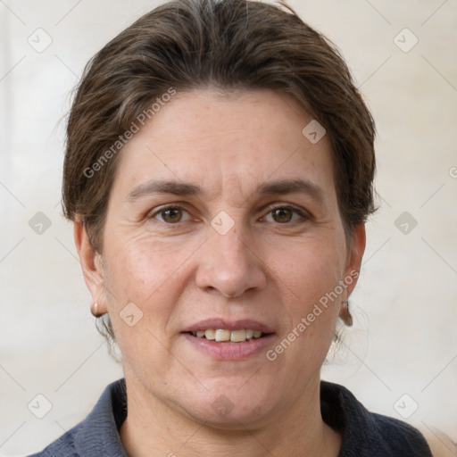 Joyful white adult female with short  brown hair and grey eyes