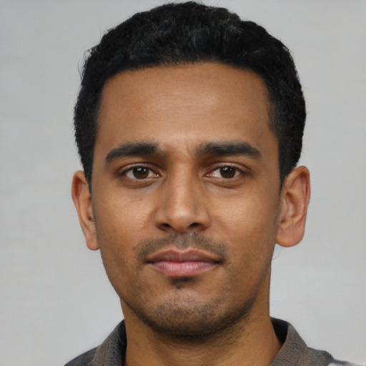 Neutral latino young-adult male with short  black hair and brown eyes