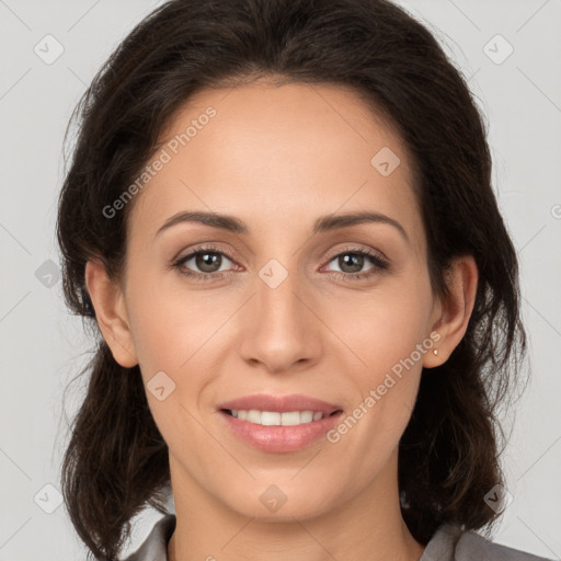 Joyful white young-adult female with medium  brown hair and brown eyes