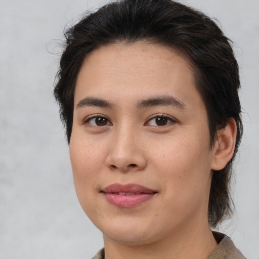 Joyful white young-adult female with medium  brown hair and brown eyes