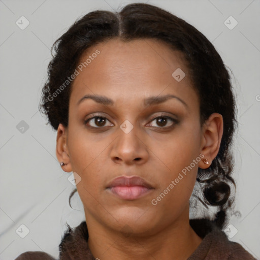 Neutral black young-adult female with medium  brown hair and brown eyes