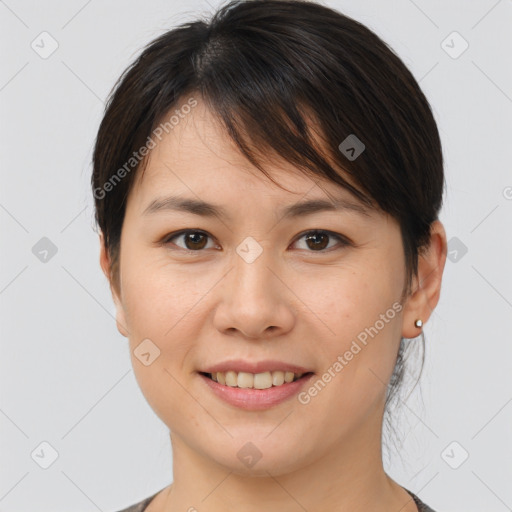 Joyful white young-adult female with medium  brown hair and brown eyes