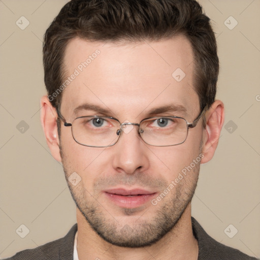 Joyful white adult male with short  brown hair and grey eyes