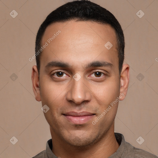 Joyful white young-adult male with short  black hair and brown eyes